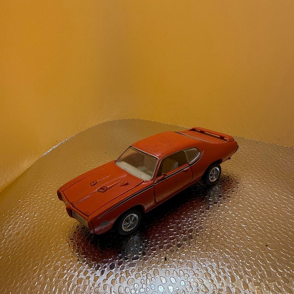 Vintage 1970s Ford Torino Diecast Model Car Orange Muscle Car Collectible